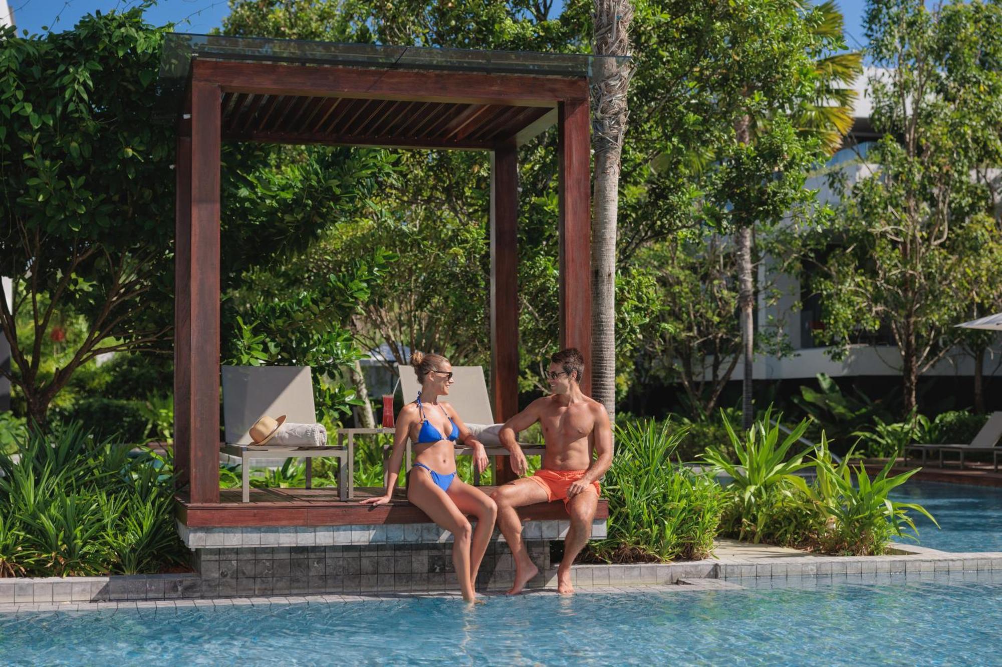 Stay Wellbeing&Lifestyle Resort Ban Bang Chak  Exterior foto A couple at the pool at the Hard Rock Hotel